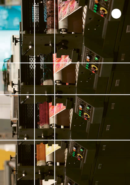 Page 12 : dos de la brochure, photographie d'une machine d'impression